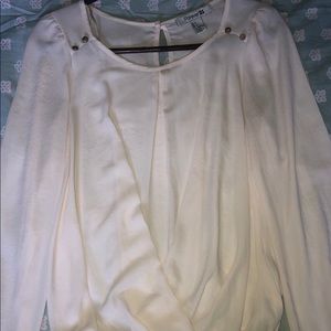 White flowing top with gold buttons